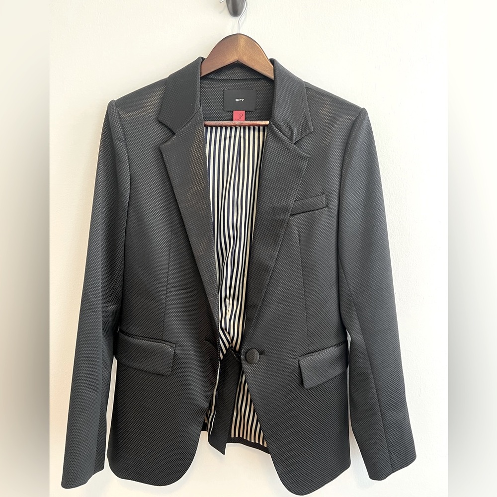 Spy Henry Lau Jacket black with beaded in the back.